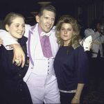"Singer Jerry Lee Lewis (C) and wife Kerrie (R) w. daughter Phoebe (L) at Rock & Roll Hall of Fame." 1986.